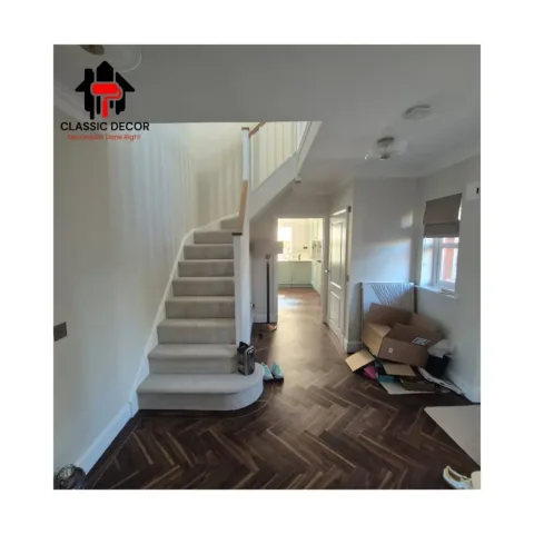 Bright hall with a painted staircase